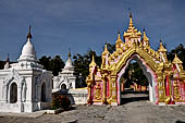 Myanmar - Mandalay, Kuthodaw Pagoda. 729 white pitaka pagodas contain the Tipitaka, the sacred texts of Theravada Buddhism. 